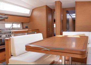 sailing-yacht-jeanneau-54-2023-totufo-dining-interior.jpg